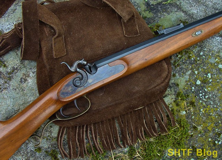 a blued flintlock rifle