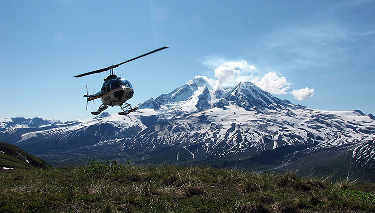 helicopter over Alaska volcano