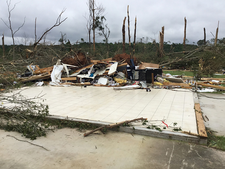 Home completely destroyed by EF4 tornado in southwest Saxon, Mississippi.