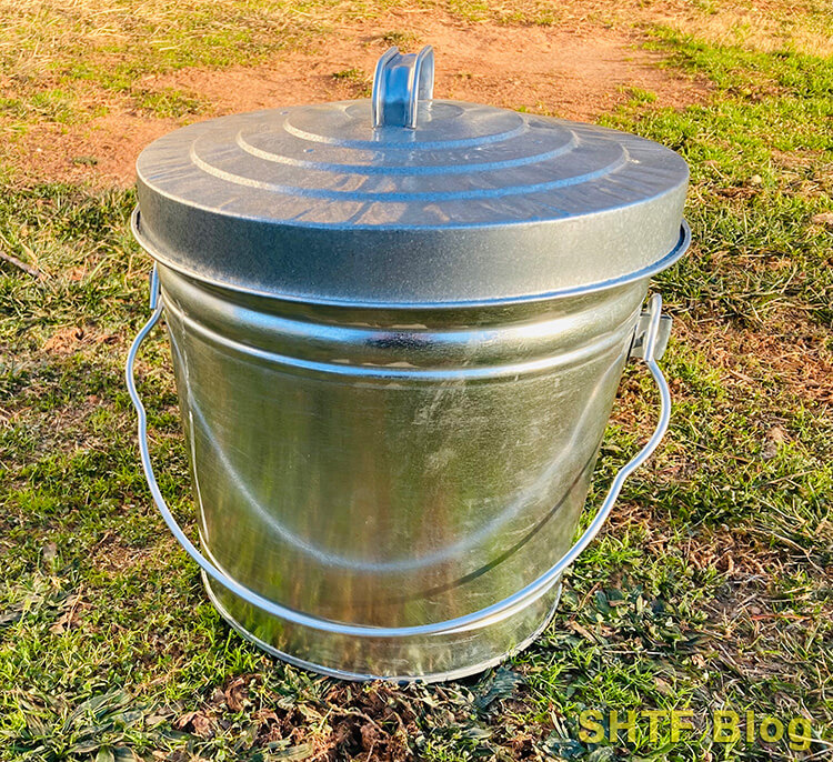 galvanized trashcan with a lid