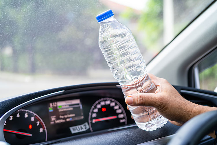 plastic water bottle in car