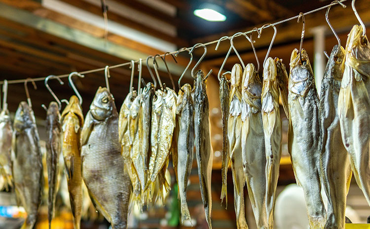salted fish hung up for sale