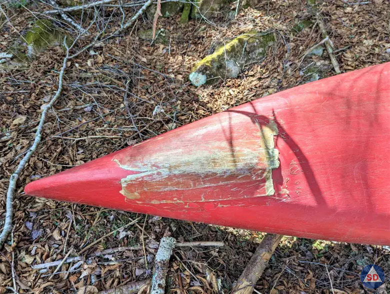 Fiberglass repair on plastic canoe