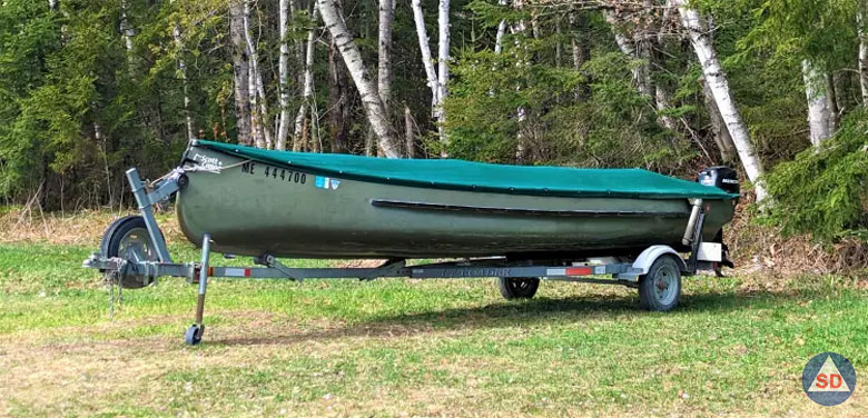 trailered square stern canoe with outboard